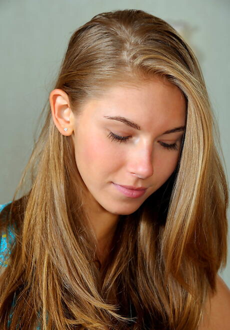 Rangy blonde young Anjelica in sexy underwear unveiling small tits and spreading her legs 